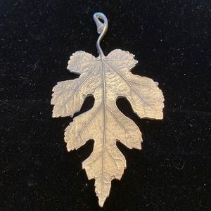 Silver leaf pendant.